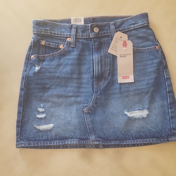 Levi's Dresses & Skirts - Levi's distressed denim skirt. 2/W26
